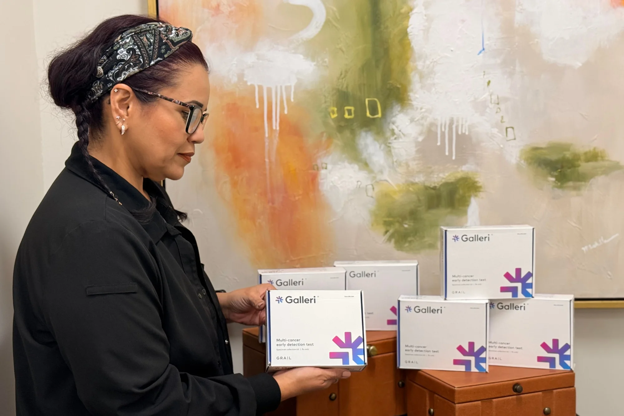 Griffin Concierge Medical staff holding a Galleri Multi-Cancer Early Detection (MCED) blood test kit.